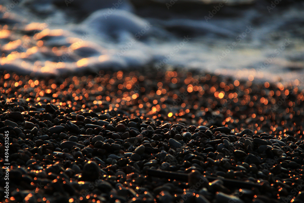 foamy water and pebble on the beach foamy water and pebble on the beach