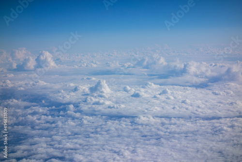 White fluffy clouds in a bright blue sky