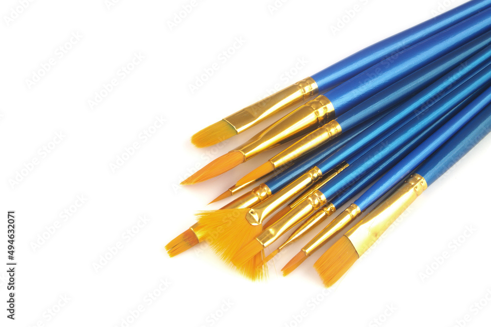Set of many blue paintbrushes isolated on white background, space for text Set of many blue paintbrushes isolated on white background, space for text