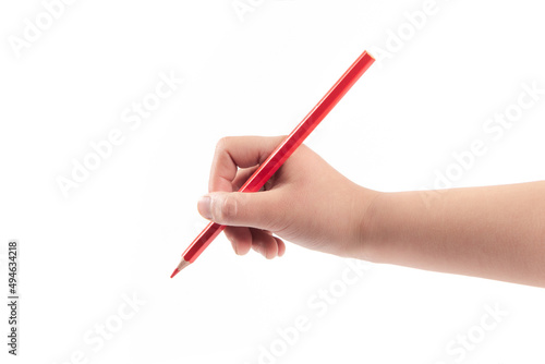kid hand holding pencil, writing or drawing, isolated on white background.