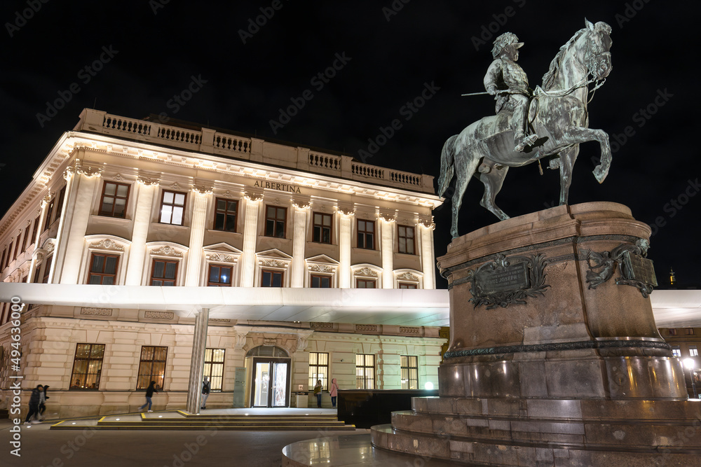 Obraz premium Evening view to Erzherzog Albrecht equestrian monument near famous Albertina museum palace in Vienna, Austria