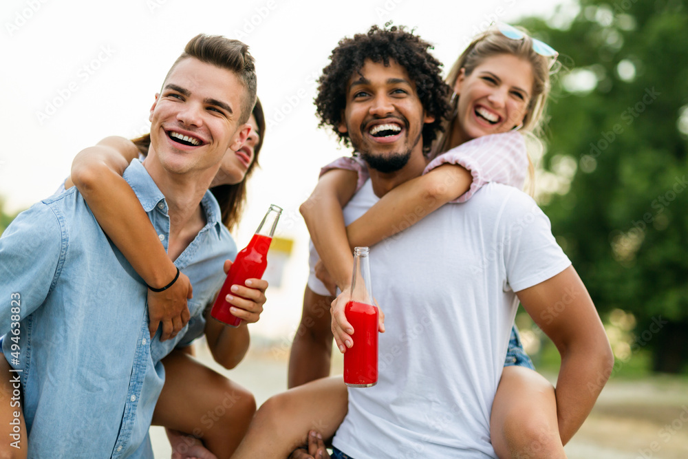 Obraz premium Portrait of friends having fun together on beach vacation. Student friend fun happiness concept.