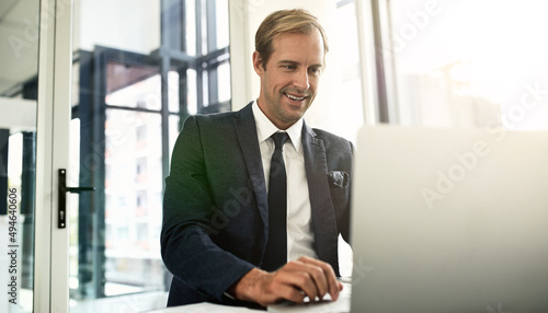 Being tech-savvy is an essential element of managing your business. Shot of a businessman using his laptop.