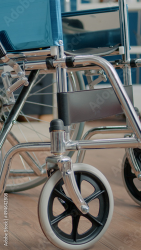 Close up of wheelchair for physical support in nursing home used by disabled people. Object of transportation for medical assistance and rehabilitation. Facility for recovery and treatment