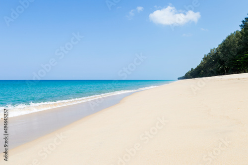 Empty white fine sandy beach in south of Thailand, Khao Lak, Thailand, clean sand beach and clear blue sky, tropical island, summer holiday destination