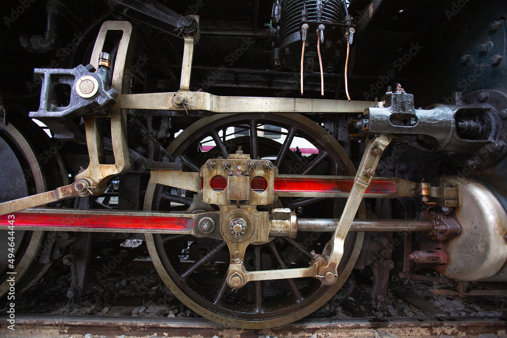 Closeup Wheels and drive device of old steam locomotive