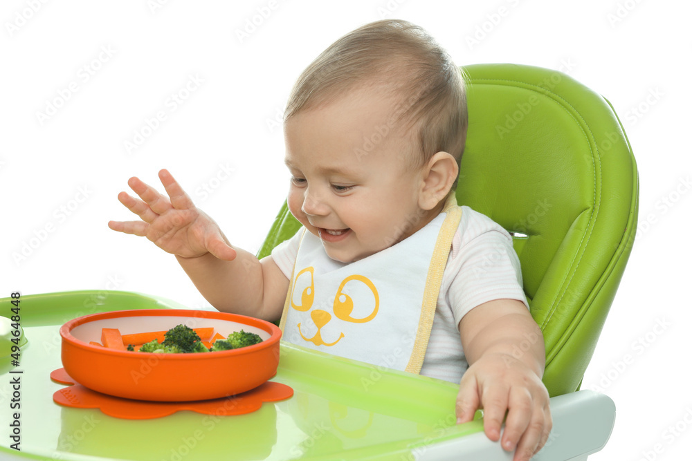 Cute little baby wearing bib while eating on white background Cute little baby wearing bib while eating on white background