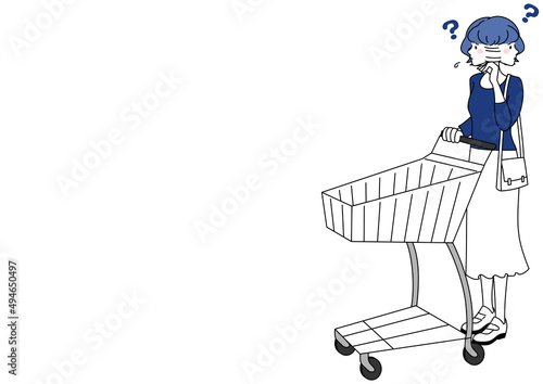 迷いながら買い物カートを押す女性