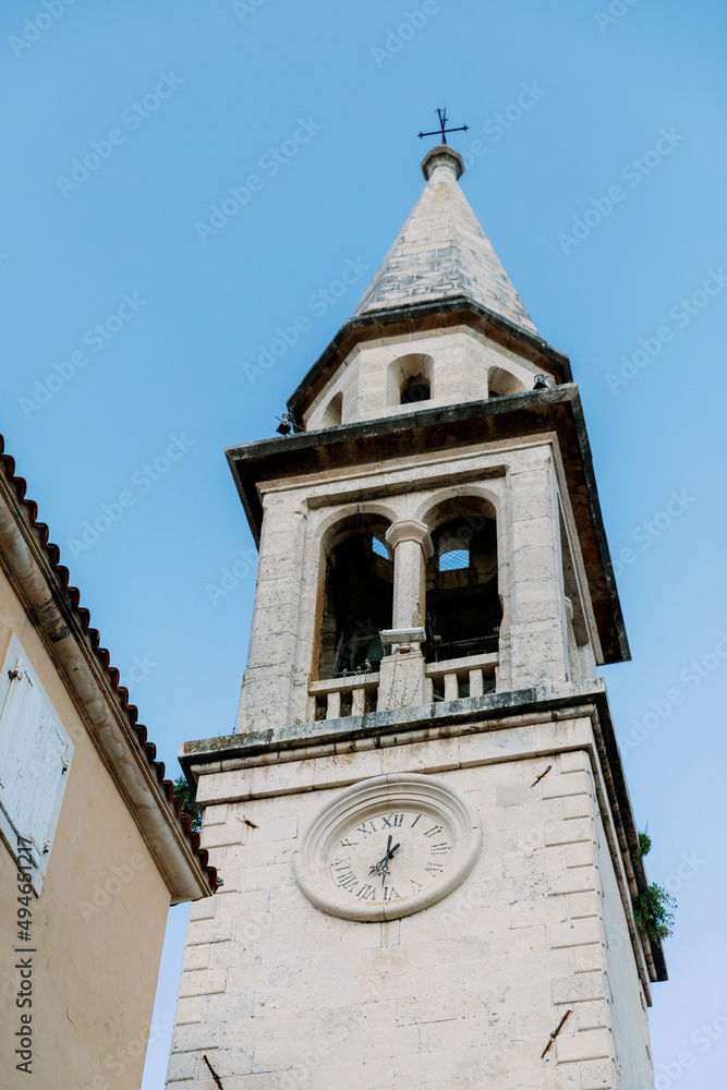 Religious architecture. Bell tower of ancient church. Bell tower of Church in Italy