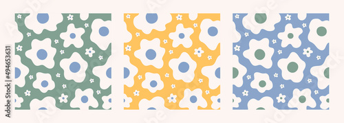 Trendy set abstract seamless patterns with white vintage groovy daisy flowers on colorful background. Retro vector background in style 60s, 70s	
