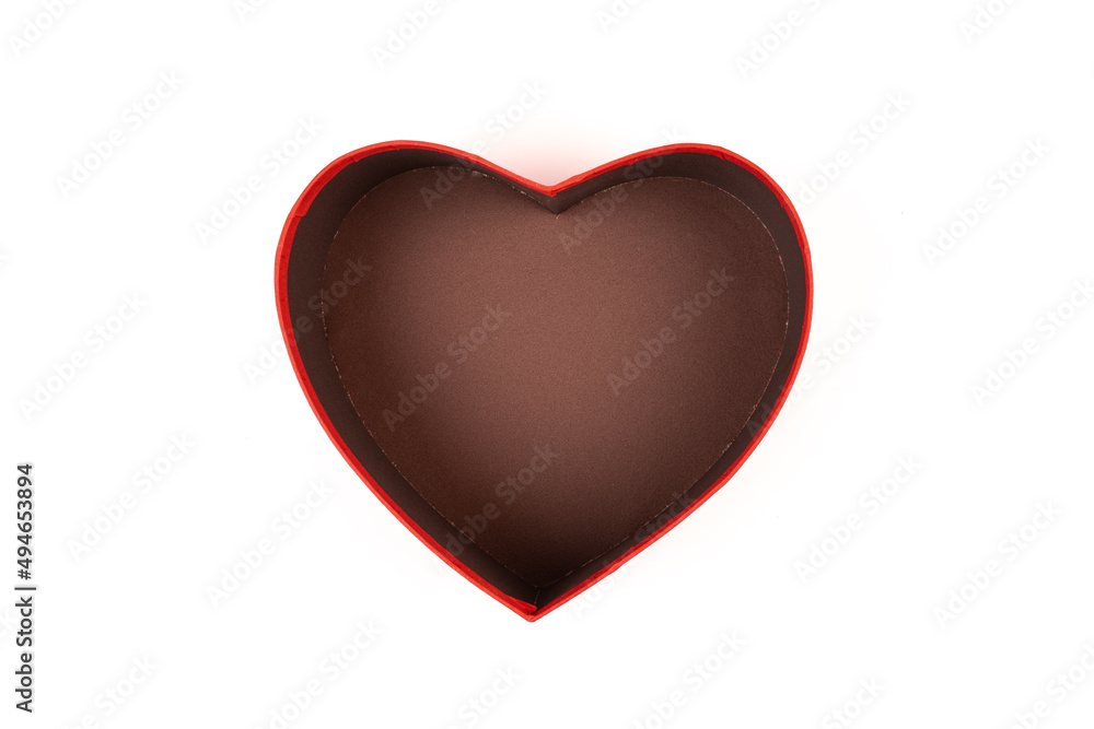 Fototapeta premium Red box in shape of heart. Gift box for Valentine's Day. Isolated on white background.