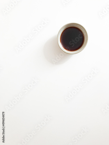 Ceramic file with Puer tea on a white background , top view, place for text