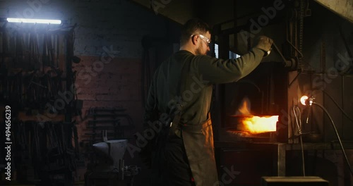 Wallpaper Mural Blacksmith workplace, iron forging workflow. Torontodigital.ca