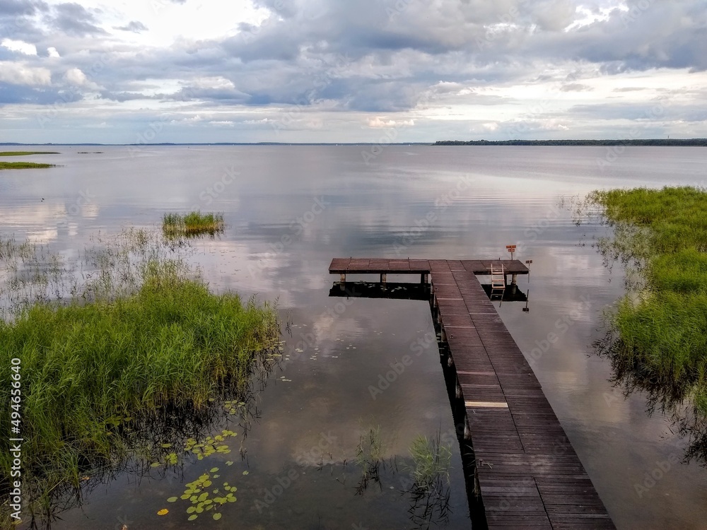 Lonely pier in the evening on the shore of Lake Śniardwy
