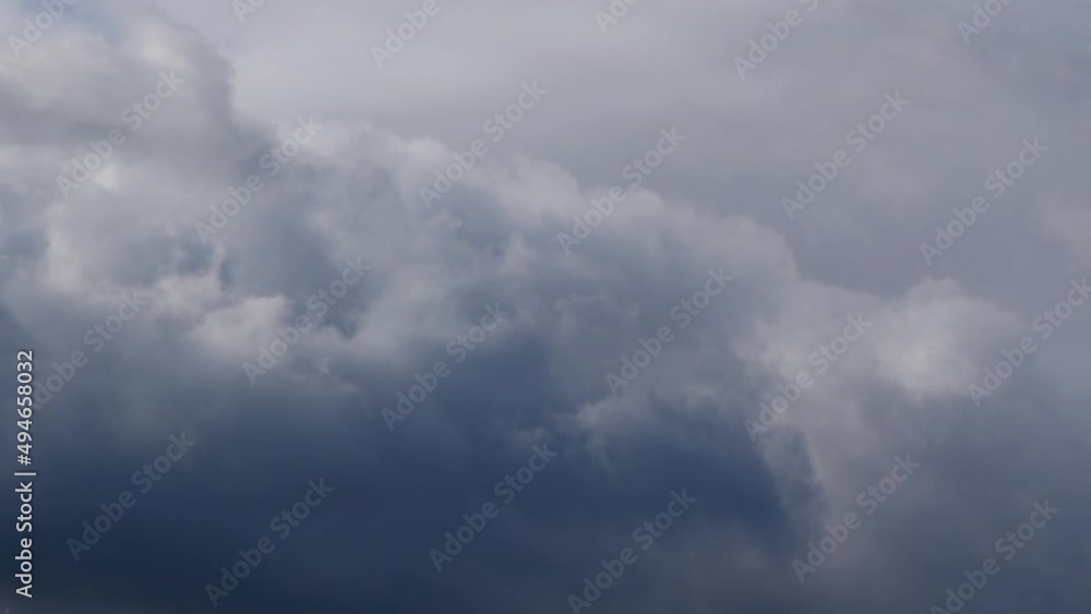 Close up dramatic eddy clouds moving in atmosphere - stormy weather conditions Close up dramatic eddy clouds moving in atmosphere - stormy weather conditions