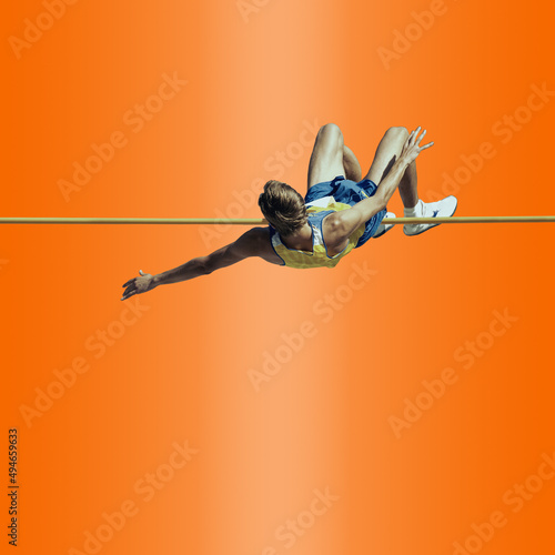Tableau sur toile Professional male pole vaulter on background in neon light