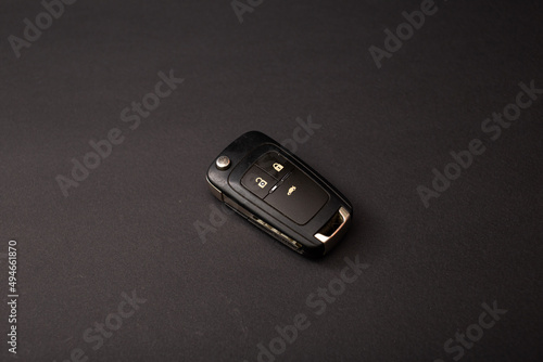 Stylish car keys, background photo, key details