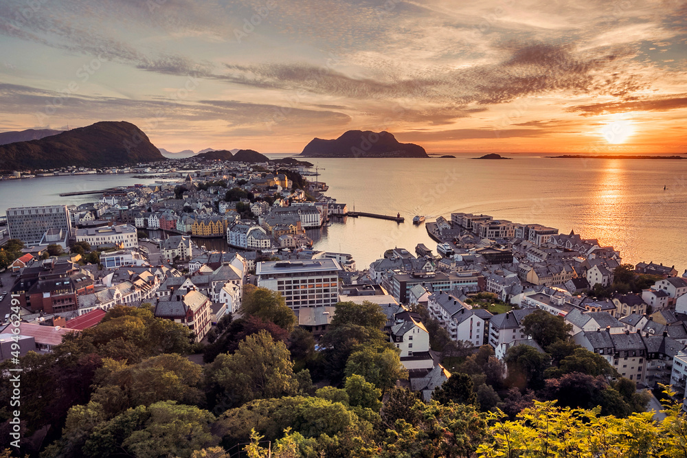 view of the old town 
Ålesund in Norway at sunset with ocean view
