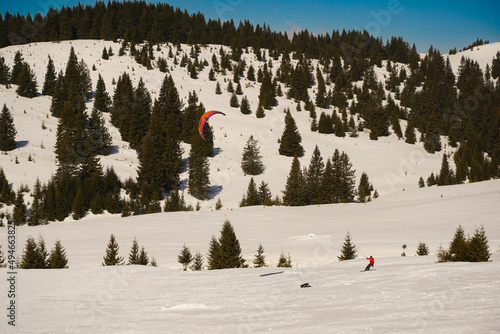 Kite Skiing. photo during the day in a beautiful winter setting.