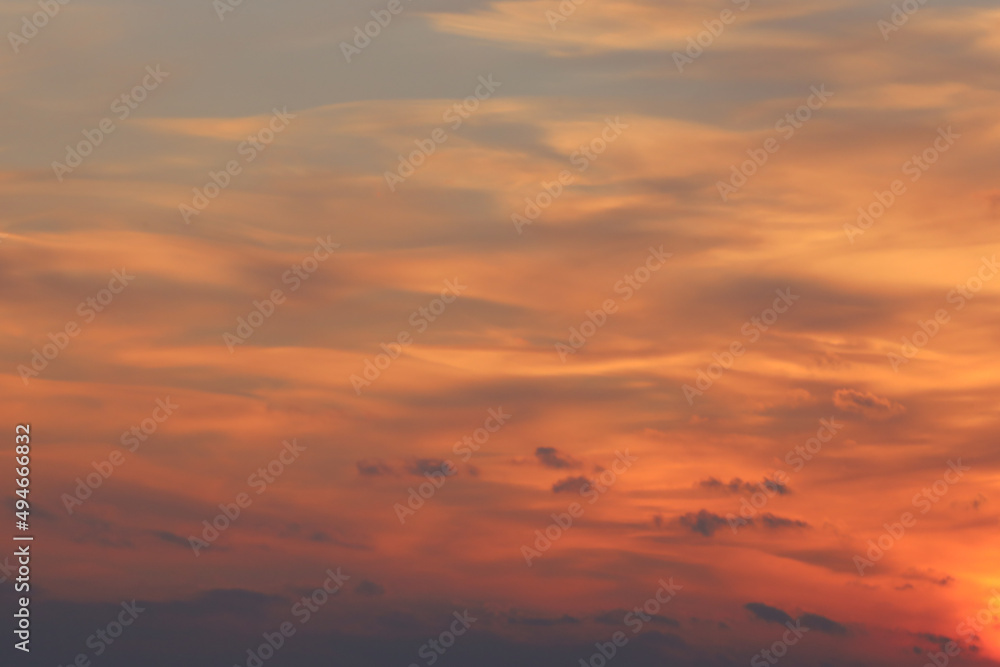 Sunset sky with feathery clouds
