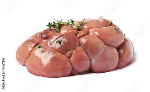 Fresh raw kidney meat with thyme isolated on white