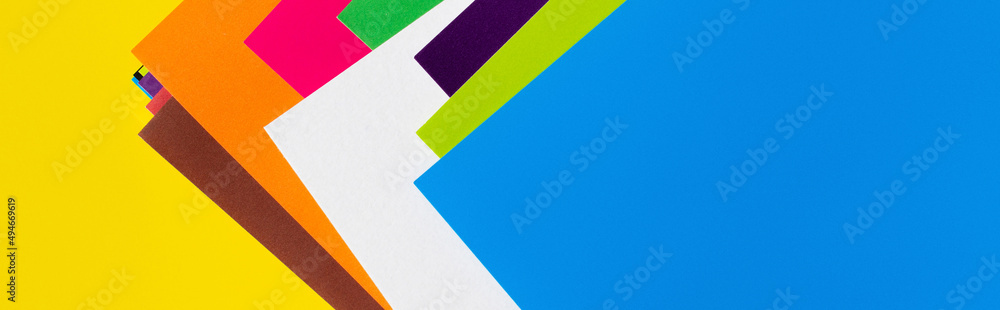 abstract geometric background with multicolored paper stripes. abstract geometric background with multicolored paper stripes.