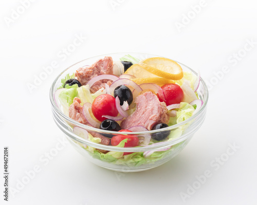 Salad with tuna on a white background