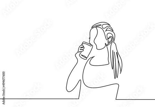 one fit athlete woman standing drinking water and laughing