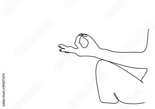 a yoga person joins his fingers close-up concept