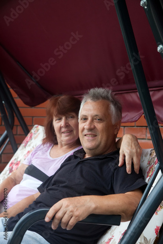 Elderly couple in casual clothes at   country house. © DariaTrofimova