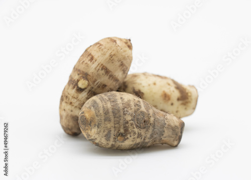 fresh taro root or Arbi on white background, it's have full on calcium and iron