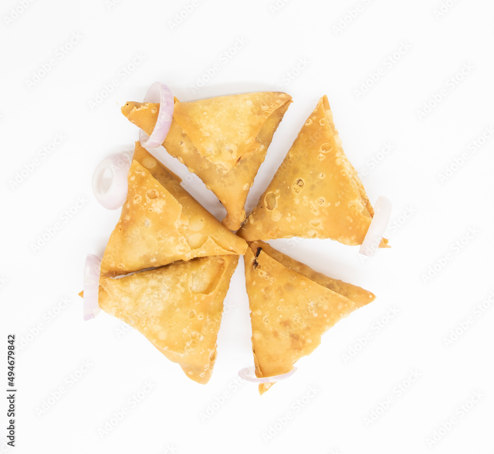 Samosa in a plate with onion isolated on white background, Samosa in a plate with onion isolated on white background,