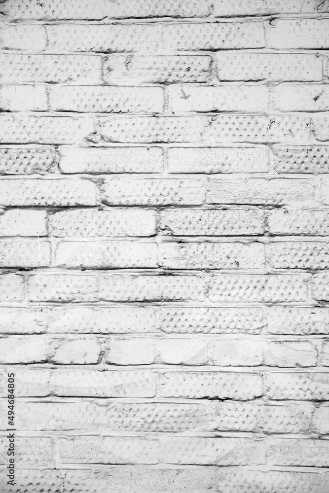 Brick wall painted with paint surface for background. Brick wall. Close-up. Old wall. Brick wall painted with paint surface for background. Brick wall. Close-up. Old wall.