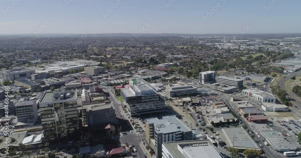 Impressive aerial perspective of inner Dandenong City flying over new and old developments on summers day. Impressive aerial perspective of inner Dandenong City flying over new and old developments on summers day.