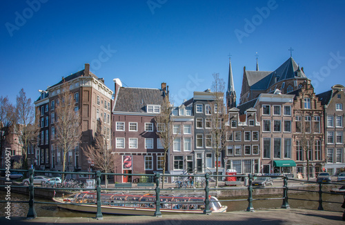 AMSTERDAM, NETHERLANDS. MARCH 19, 2022.Beautiful view of the city from the chanel