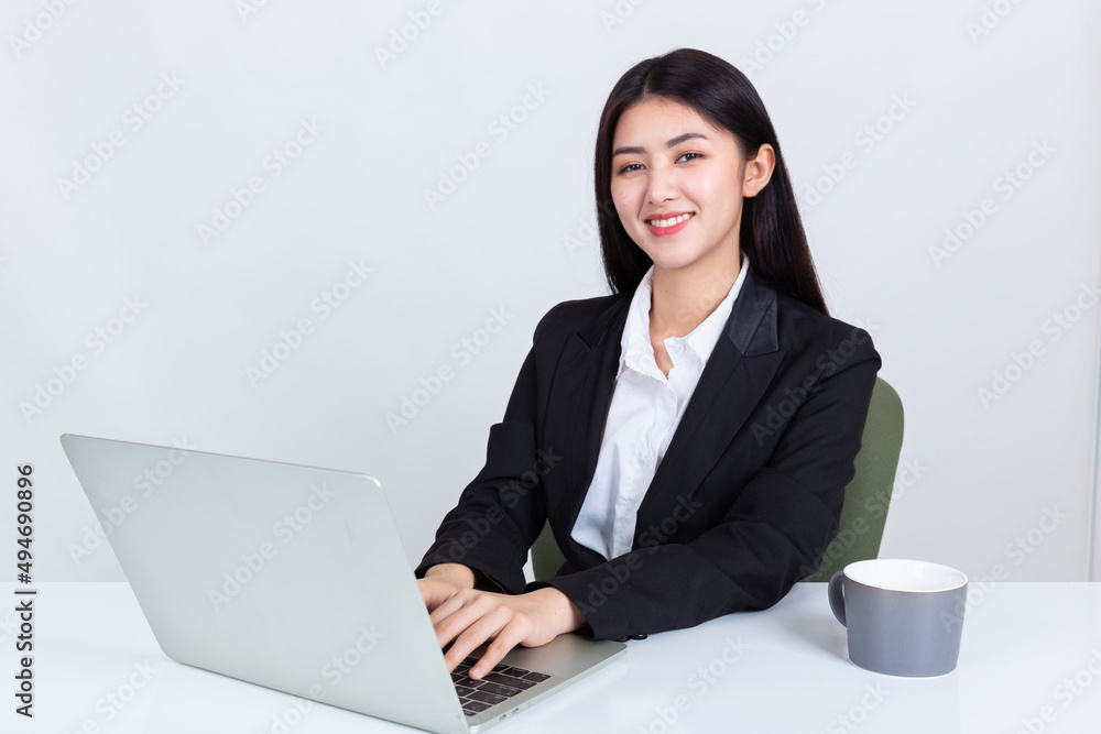 business woman sit at desk in office. business woman sit at desk in office.