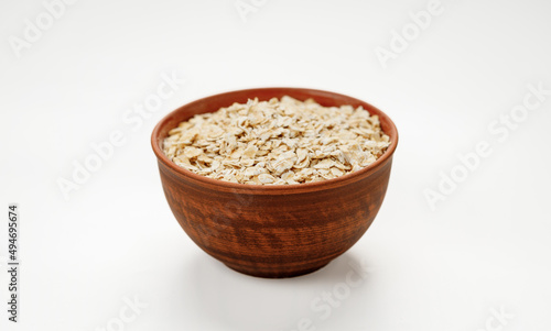 Оatmeal in bowls and bags isolated on a white background. High quality photo