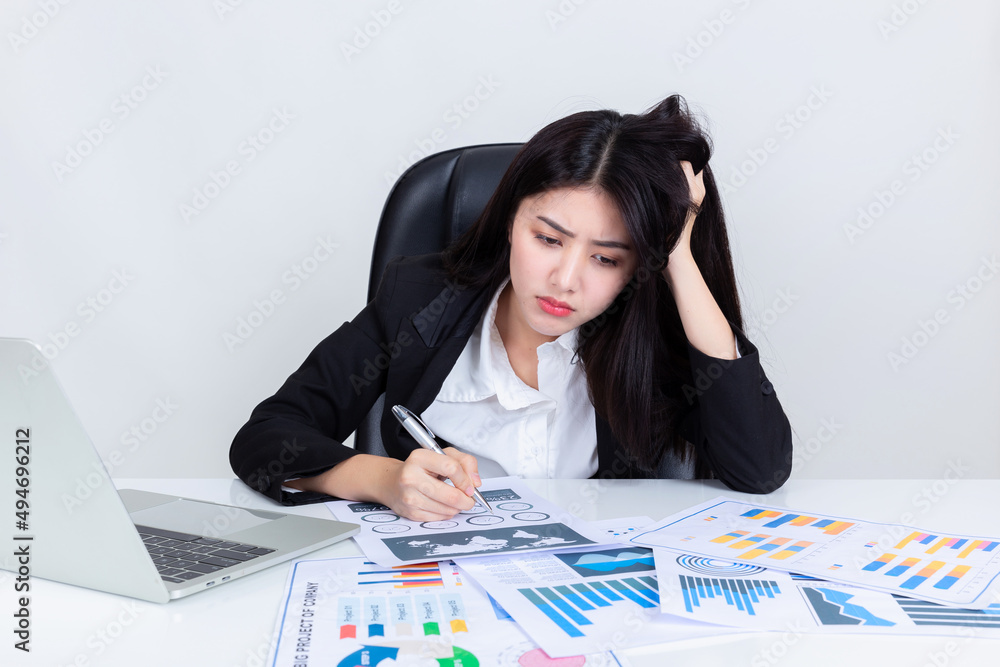Bored work, office syndrome, Asian business woman sit at desk in office. Bored work, office syndrome, Asian business woman sit at desk in office.