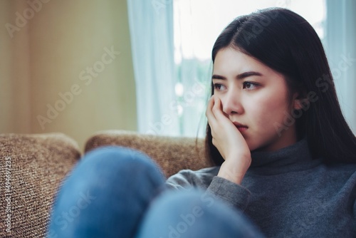 unhappy woman sit alone feeling bad , Emotional girl depressed, copy space vintage tone style.