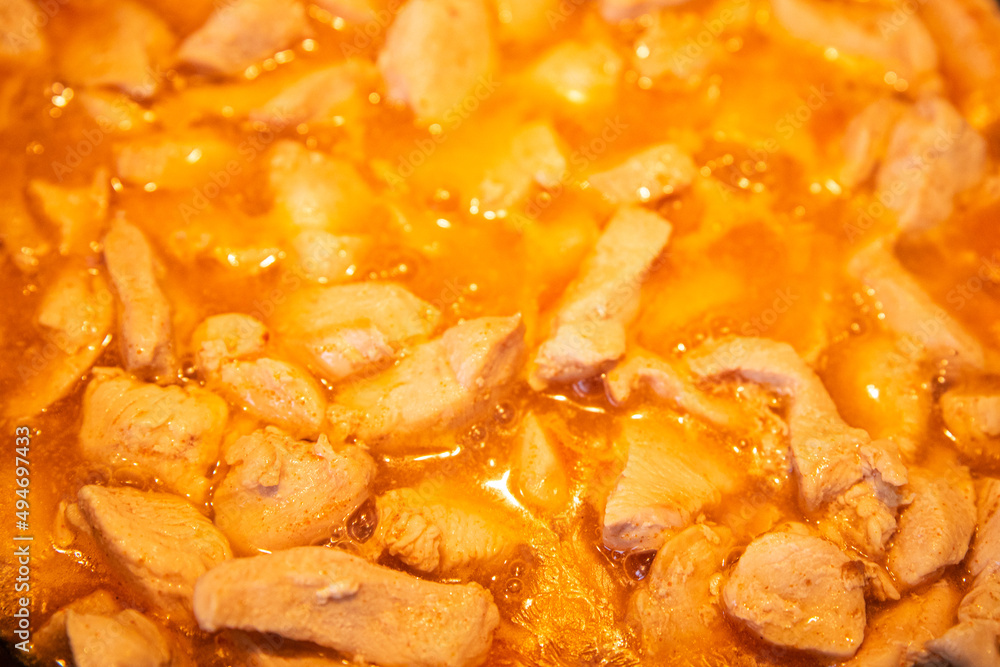 chicken meat in tomato sauce curry in frying pan cook meal fresh poultry meat portion healthy meal food diet snack on the table copy space food background rustic top view chicken meat in tomato sauce curry in frying pan cook meal fresh poultry meat portion healthy meal food diet snack on the table copy space food background rustic top view