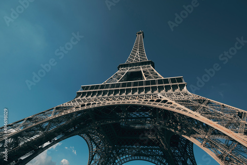 eiffel tower detail with blue sky backgrounf