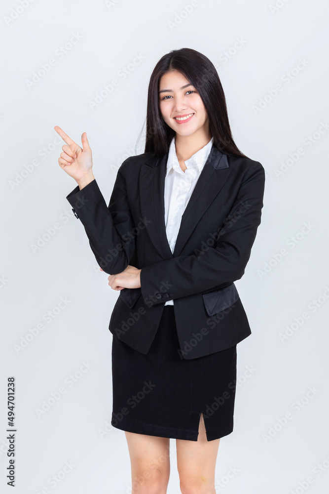 asian woman hands pointing to copy space for your promotional or text on white background. asian woman hands pointing to copy space for your promotional or text on white background.