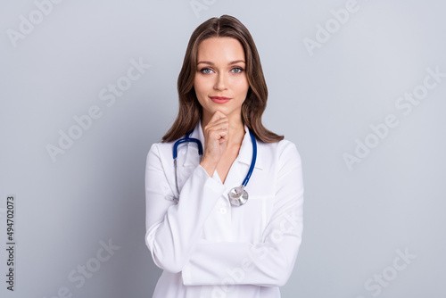Photo of young attractive confident woman family doc hand touch chin clever isolated over grey color background
