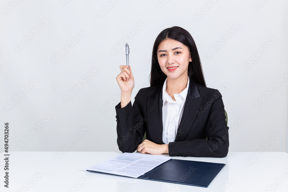 asian business woman working in office with documents. asian business woman working in office with documents.