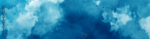 Abstract dark blue watercolor painted sky mottled blue background with vintage marbled textured design on cloudy sky blue banner panoramic background. Soft clouds in blue sky watercolor background.