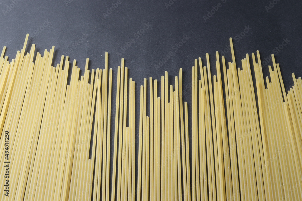 Pasta isolated on a black background. Pasta, spaghetti, shells, tubes. Pasta isolated on a black background. Pasta, spaghetti, shells, tubes.