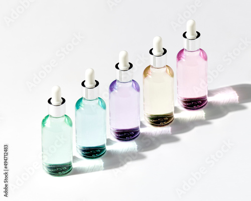 Bottles with colorful Hyaluronic acid photo