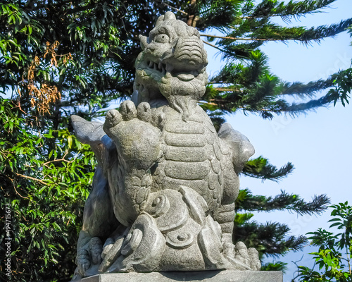 Sha Tin, Hong Kong, China - September 19 2019: Ten Thousand Buddhas Monastery, stone chinese dragon sculpture