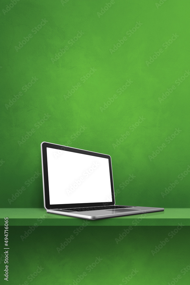 Laptop computer on green shelf. Vertical background Laptop computer on green shelf. Vertical background