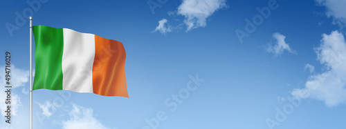 Irish flag isolated on a blue sky. Horizontal banner